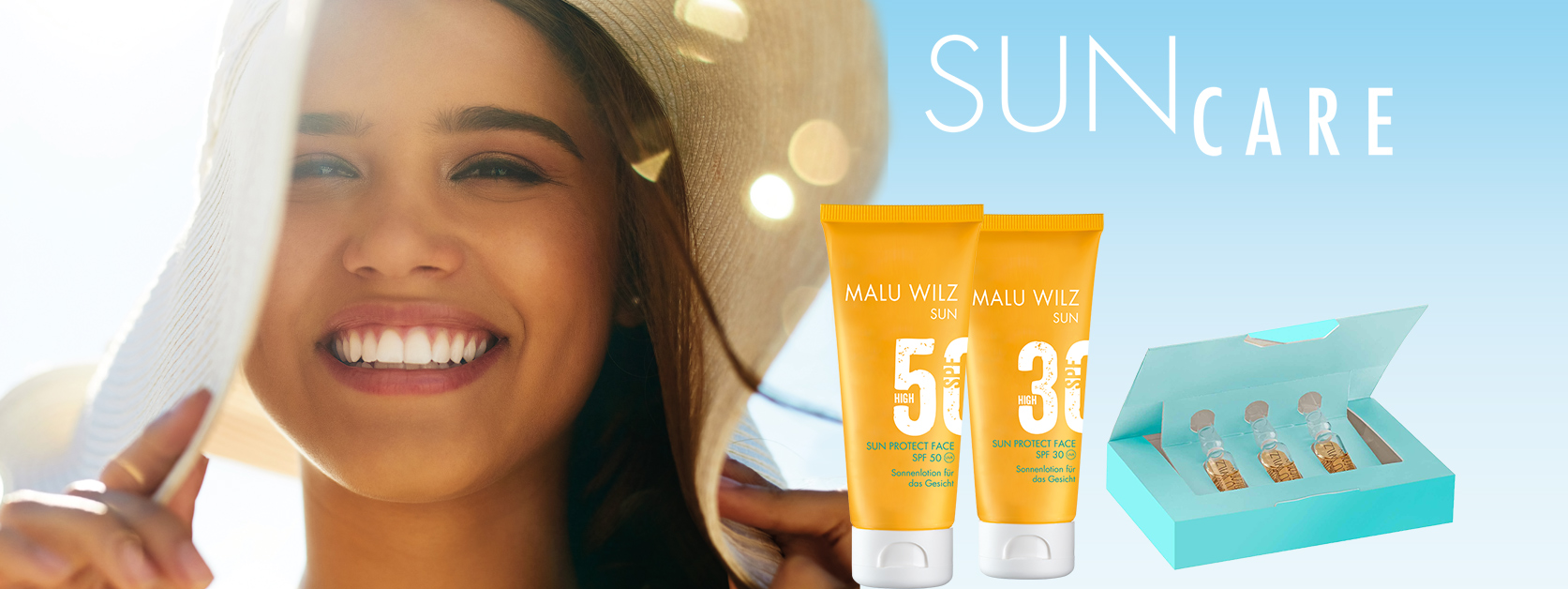 Sonnenpflege-Produkte für den Schutz der Haut junge Frau mit Sonnenhut und Sonnenpflege