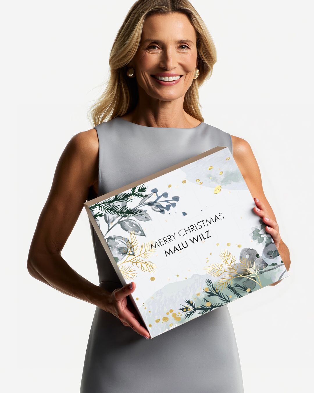 > Get the Christmas glow for your skin! Woman with Advent calendar