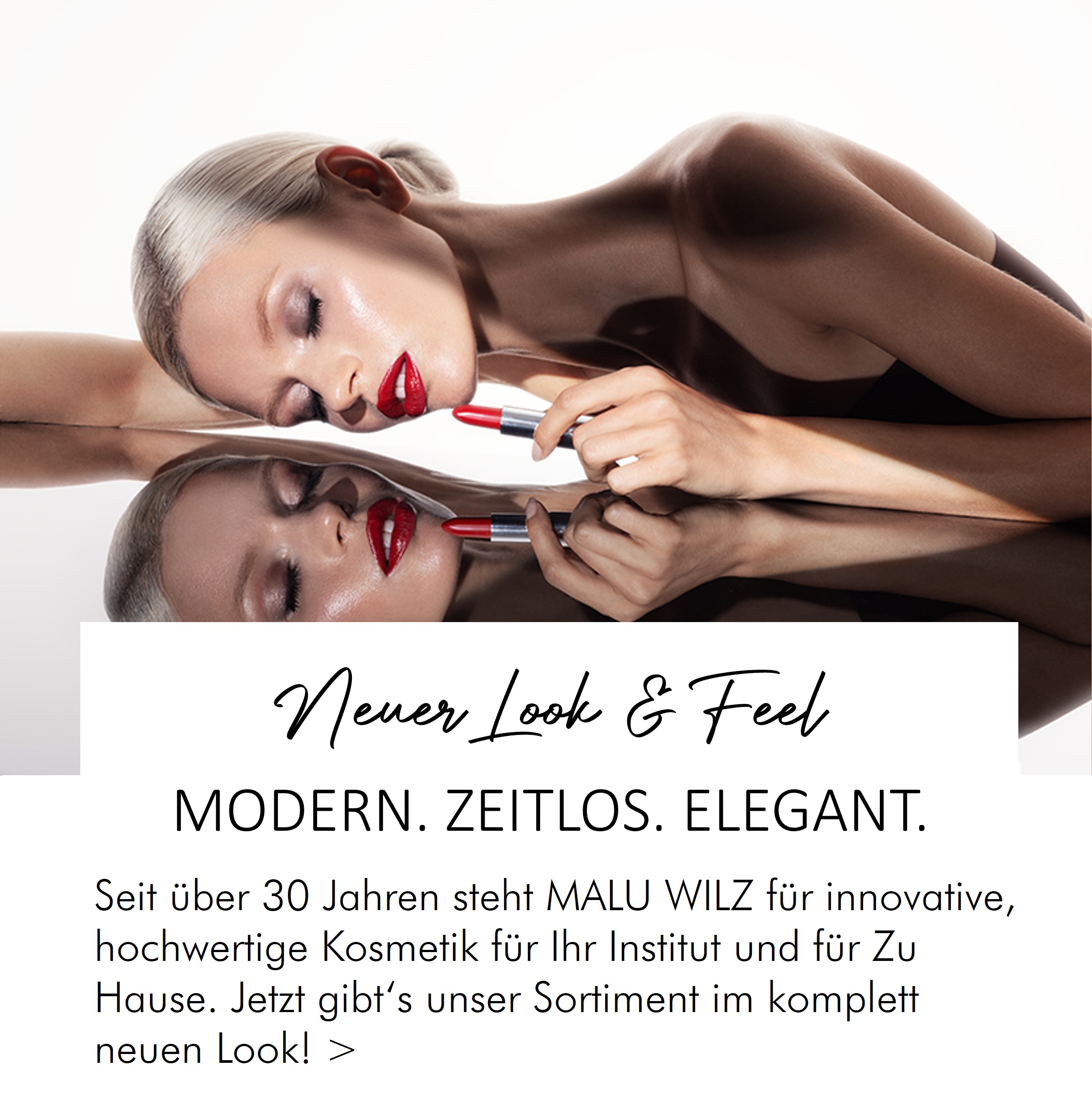 Model mit rotem Lippenstift vor Spiegel - Symbolbild für den neuen, modernen Markenauftritt von MALU WILZ Kosmetik