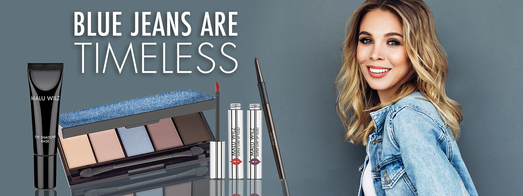 Verpassen Sie Ihrem Jeans-Look das gewisse Etwas! Porträt junge Frau mit Make up Produkten