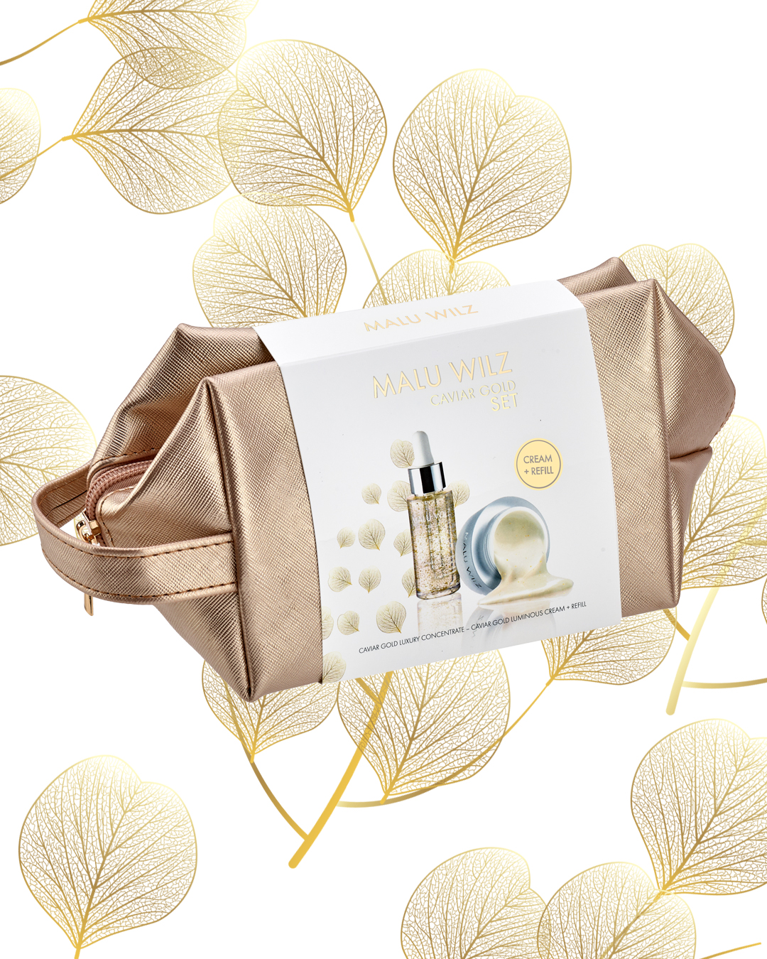 goldene Kosmetiktasche mit Hautpflege und goldene Blätter
